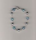Blue irridescent and silver beaded chain bracelet.
