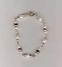 Brown to white beaded chain bracelet.