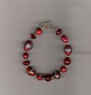 Red oriental bracelet.